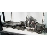 MODEL OF AN AMERICAN TRUCK AND TRAILER, made from machine parts, 96cm L.