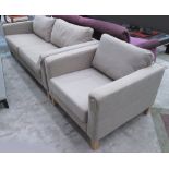 SOFA, two seater, in a beige fabric on square supports, 206cm L plus a matching armchair, 91cm W.