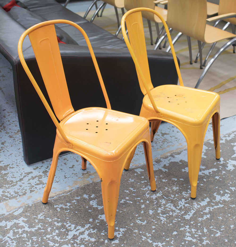 TOLIX STYLE CHAIRS, a set of six, in orange painted metal, 36cm W.