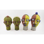 IFE BEADED HEADS, two various companion pairs, with all over colourful beadwork decoration.