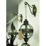 HANGING LANTERNS, a pair, globe type on wall brackets, 80cm H.