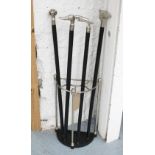 WALKING STICK RACK, in chromed metal, 32cm x 17cm x 51cm H plus four various walking sticks, 95cm H.