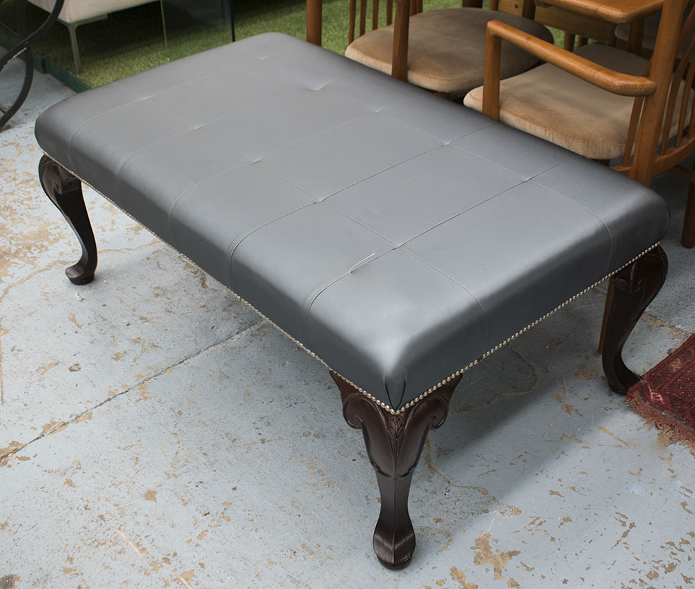 FOOTSTOOL, in blue pocketed leather on cabriole supports, 120cm x 70cm x 48cm H.