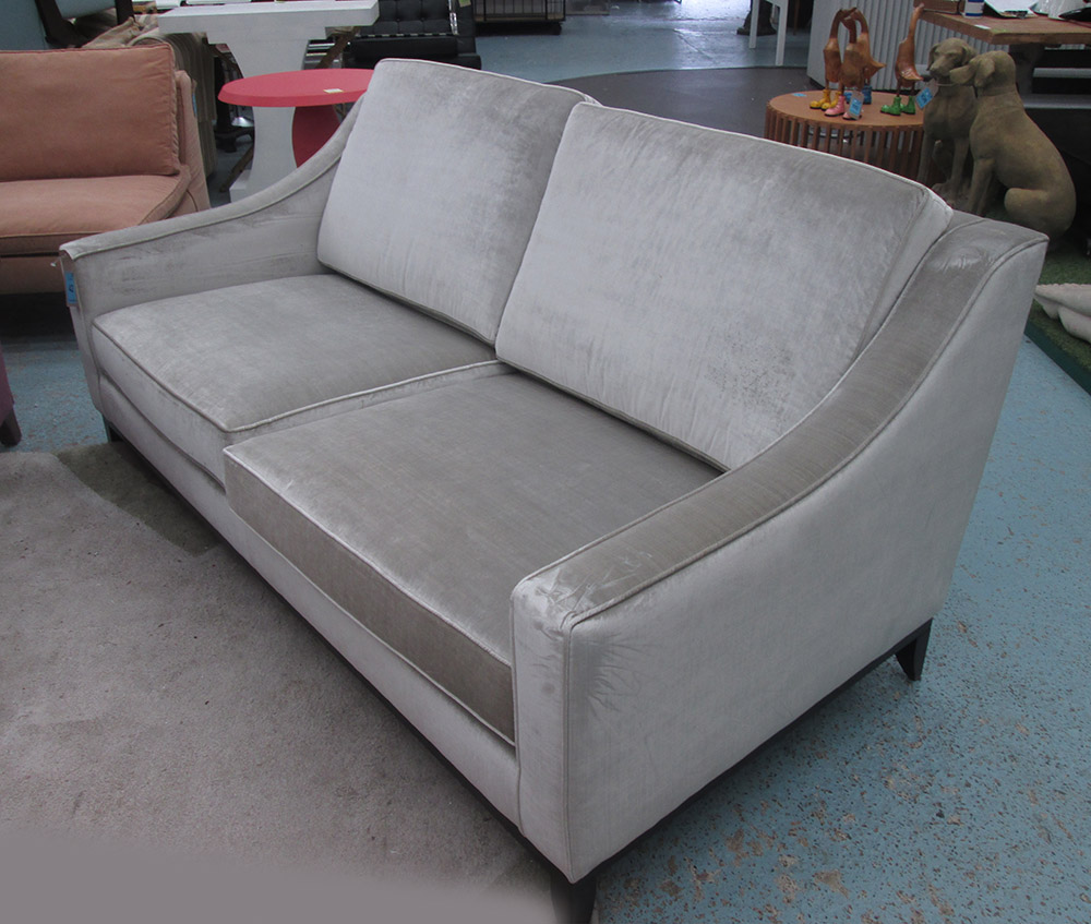 SOFA, two seater, in grey crushed velvet on ebonised square supports, 189cm L.