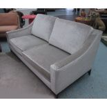 SOFA, two seater, in grey crushed velvet on ebonised square supports, 189cm L.