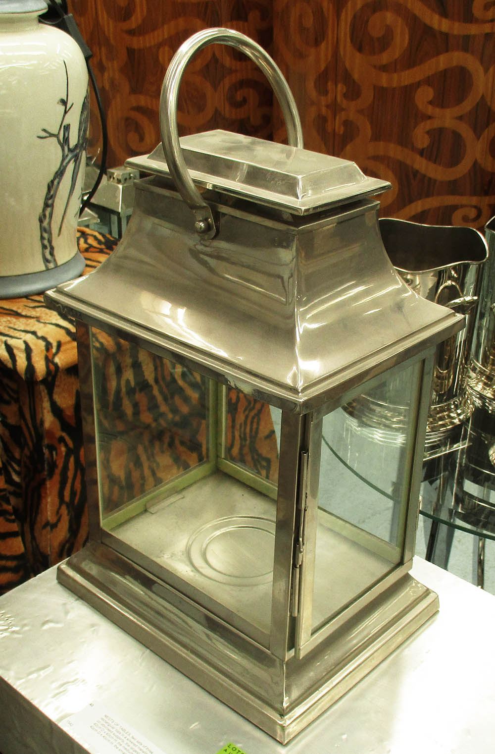 STORM LANTERN, of cuboid form in a plated metal frame, 52cm H.