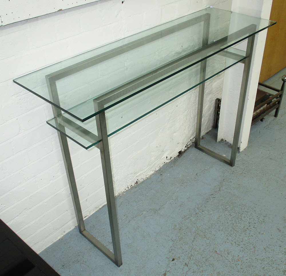 CONSOLE TABLE, contemporary, with glass top and glass under shelf on a square metal frame,