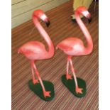 FLAMINGOS, a pair, in coloured resin finish, 92cm H.
