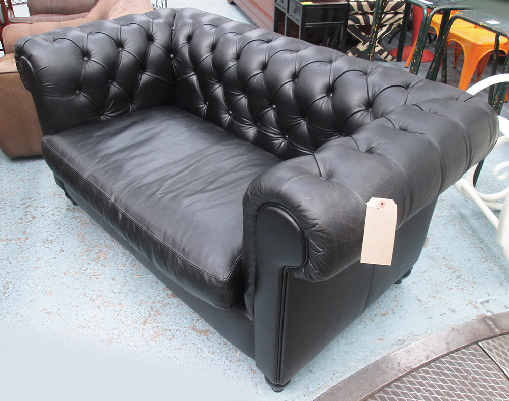 CHESTERFIELD SOFA, two seater, from Habitat, black leather with button back on turned supports,