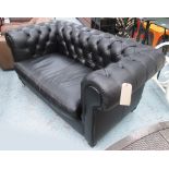 CHESTERFIELD SOFA, two seater, from Habitat, black leather with button back on turned supports,