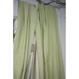 CURTAINS, a pair, in lime green, lined, 140cm W (gathered) x 240cm L.