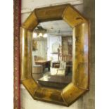 WALL MIRROR, with bird decoration and a central bevelled plate within a cushioned frame,