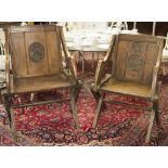 GLASTONBURY CHAIRS, two similar, Victorian oak each with coat of arms carved backs, largest 74cm W.