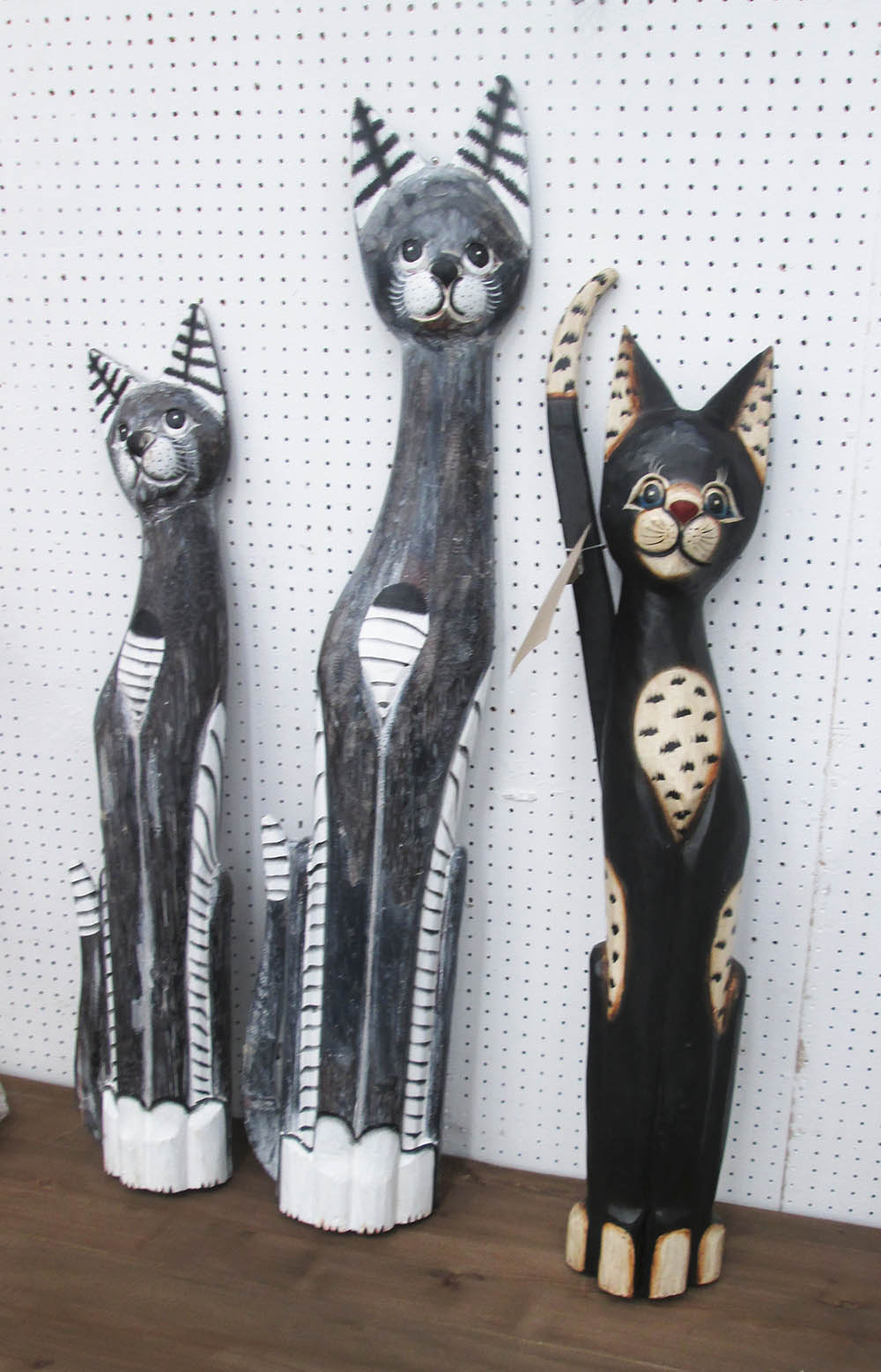 WOODEN CATS, a set of three, retro art designs carved solid wood painted finish, tallest 98cm H.