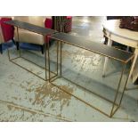 CONSOLE TABLES, a pair, gilt metal framed with a rectangular slate coloured top,