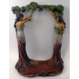 ART NOUVEAU STYLE, mirror frame, painted ceramic of figurative form,