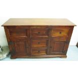 CHEST, of five short drawers and two cupboard in hardwood, 131cm x 46cm x 82cm H.