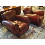 ART DECO ARMCHAIRS, a matched pair, in a umber leather, 90cm x 100cm x 75cm.