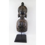 MENDE HEAD MASK, West African, carved wood in female form, 60cm H plus display stand.