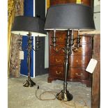 PAIR OF LAMPS, Classical style polished metal with black shades, 107cm H.