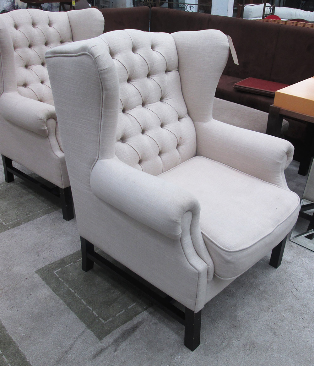 WINGBACK ARMCHAIRS, a pair, button back in neutral fabric on square supports, 85cm W.