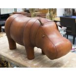 FOOTSTOOL, in the form of a hippopotamus in tanned leather, 59cm L.