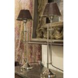 DESK LAMPS, a pair, adjustable silver plated with leather shades, 21cm D x 70cm lowest H.