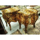 BOMBE BEDSIDE COMMODES, a pair, in tiger print finish, 71cm W x 41cm D x 75cm H.