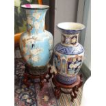 DECORATIVE VASES, two various, Asian ceramic, 64cm H and 51cm H, plus stands.