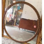 CIRCULAR MIRROR, in ornate gilt frame, 83cm diam.