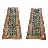 FINE KAZAK RUNNERS, a pair, stylised boteh design field within complimentary geometric borders,