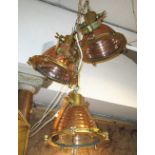 INDUSTRIAL MANNER CEILING LIGHTS, a set of three, in brass and copper, 30cm H.