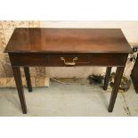 HALL TABLE, George III mahogany of adapted shallow proportions with short frieze glove drawer,