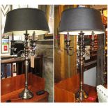 PAIR OF LAMPS, Classical style polished metal with black shades, 107cm H.