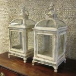 GARDEN LANTERNS, a pair, distressed metal with a handle to the top and glazed panels,