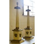 TABLE LAMPS, a pair, gilt and painted metal of ionic column form, 62cm H x 15cm W.