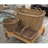 COLLECTION OF BASKETS, three, largest 65cm x 60cm H x 109cm.