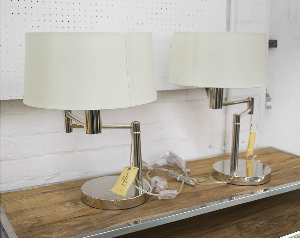 TABLE LAMPS, a pair, Ralph Lauren swing arm in chromed metal finish with shades, 49cm H.