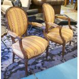 FAUTEUILS, a pair, carved showframes and striped fabric, each 59cm W x 88cm H x 48cm D.