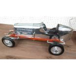 MODEL RACING CAR, in aluminium finish, 51cm L.