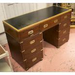 CAMPAIGN STYLE PEDESTAL DESK, mahogany, the newly leathered top with brass trim, 122.