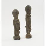 LOBI TWIN FIGURES, a companion pair, carved wood, from the Gaoua region of Burkina Faso,
