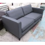 SOFA, two seater in charcoal fabric on square ebonised supports, 196cm L.