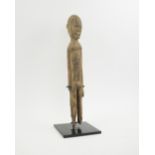 STANDING LOBI FIGURE, carved wood, from the Gaova region of Burkina Faso, 49cm H [ex.