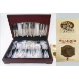 GEORGE BUTLER CANTEEN OF CUTLERY, seven place setting 'Heirloom Collection' cased.