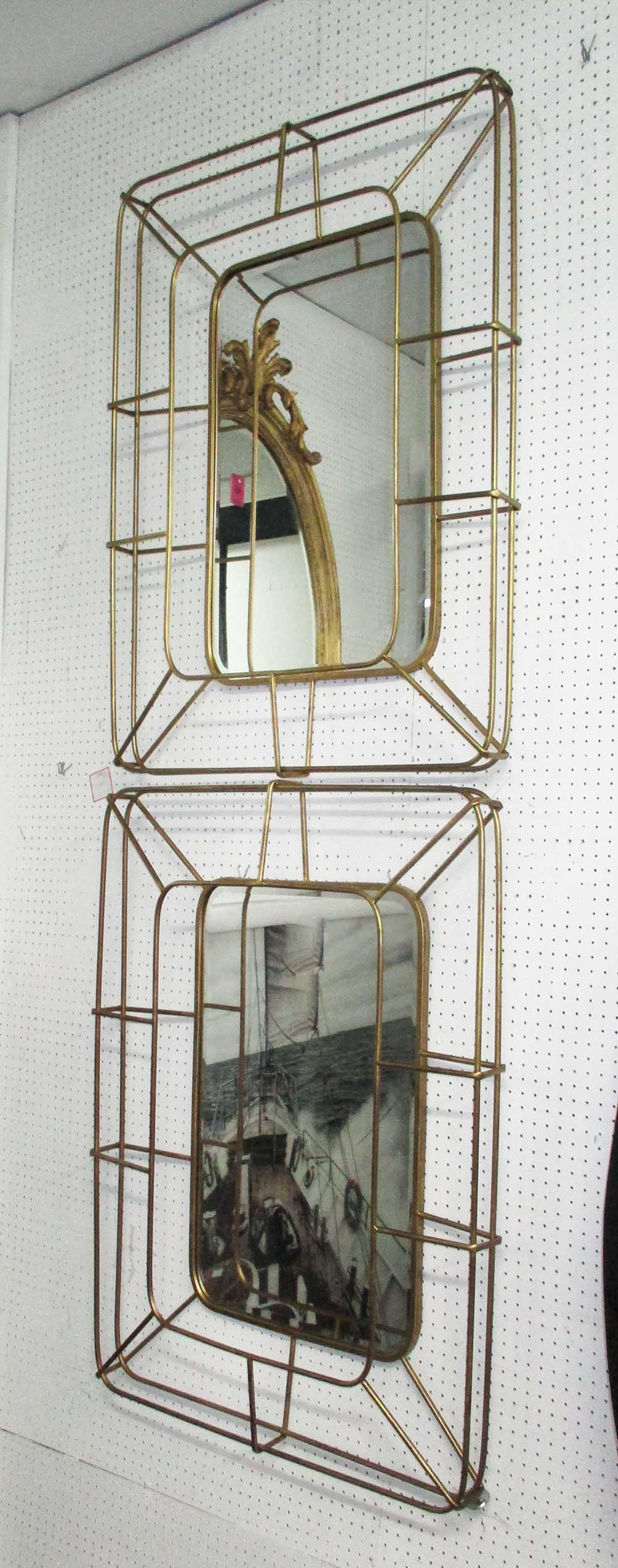 MIRRORS, a pair, bevelled glass on a gilded metal tubular frame.