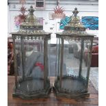 STORM LANTERNS, a pair, square form in a bronzed style metal frame, 63cm H.
