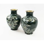 JAPANESE CLOISONNE VASES, a pair, early 20th century decorated bamboo leaves on a green ground,