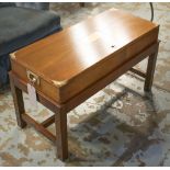 LOW TABLE, mahogany with campaign style box top raised on squared supports,