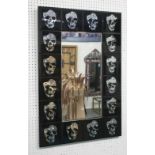 MIRROR, bevelled in a black skull motif border, 90cm x 60cm.